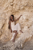 Navaia Dress in Organic Cotton and Linen Blend with Shimmering Trims, Braided Accents, and Hand-Beaded Glass Beads and Freshwater Pearls for Elegant Styling.