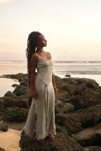 Navaia Dress in Organic Cotton and Linen Blend with Shimmering Trims, Braided Accents, and Hand-Beaded Glass Beads and Freshwater Pearls for Elegant Styling.