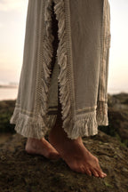 Navaia Dress in Organic Cotton and Linen Blend with Shimmering Trims, Braided Accents, and Hand-Beaded Glass Beads and Freshwater Pearls for Elegant Styling.