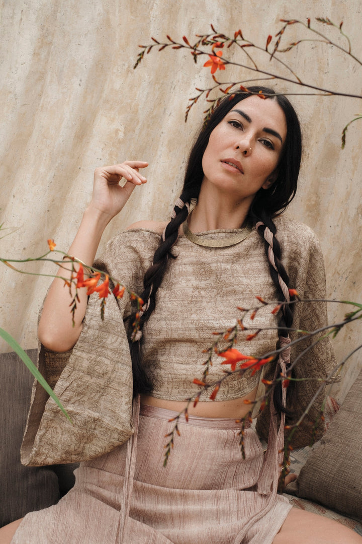 Model wearing Padma raw silk Bali boho shirt in natural cream

