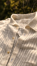 Collar and button placket detail of the Udara shirt