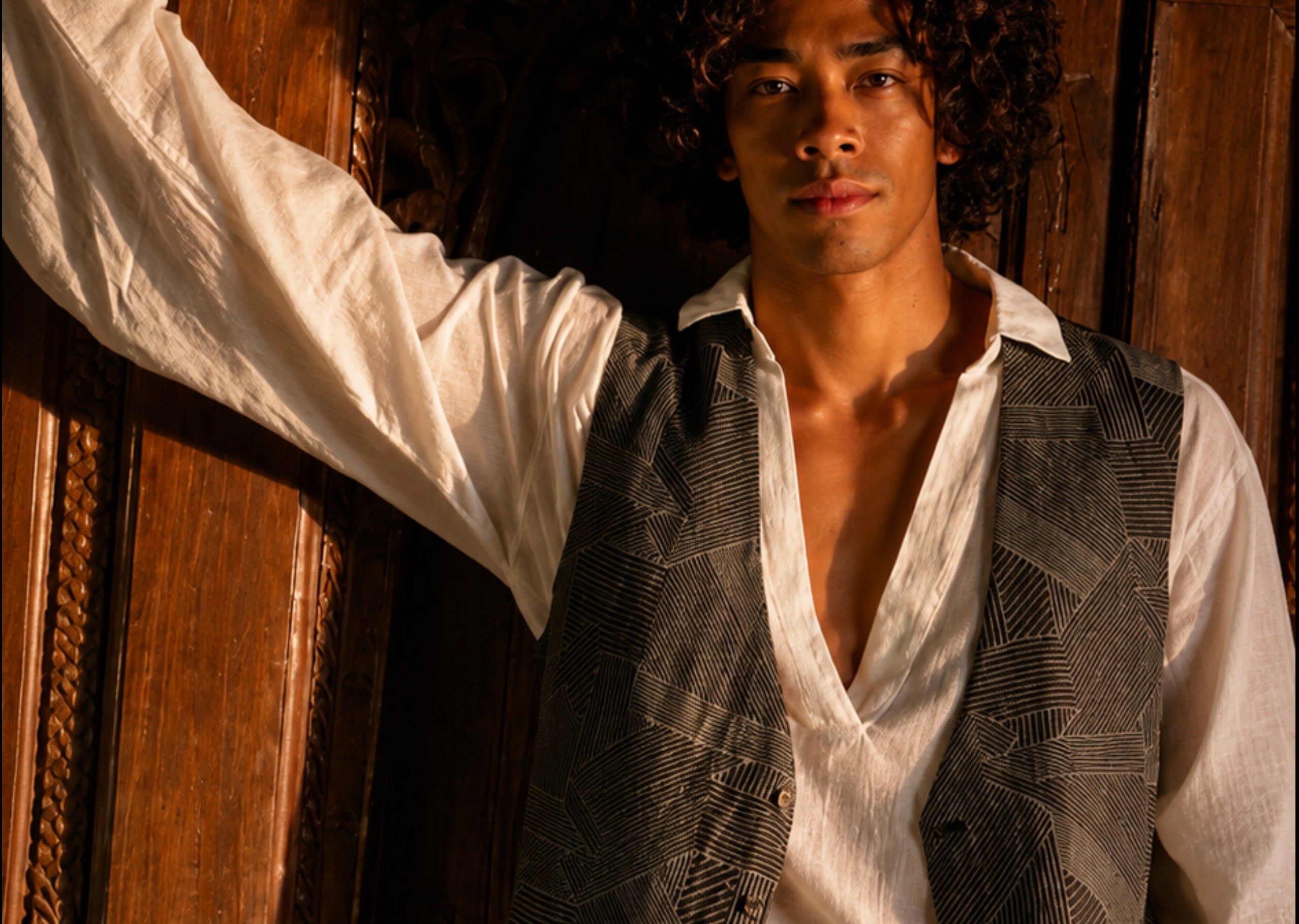 Man wearing the embroidered Zephyr vest from the Embroidery Men Collection