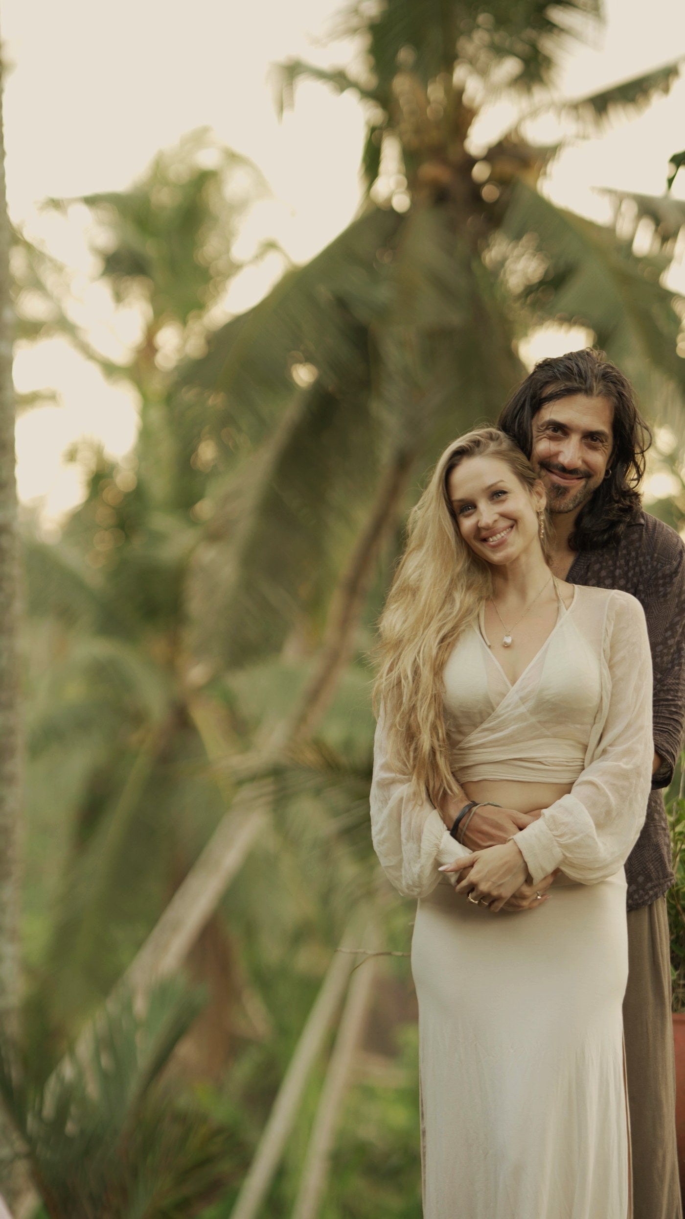 Oona and Baptiste, founders of Bird of Paradise, among the palms in Bali